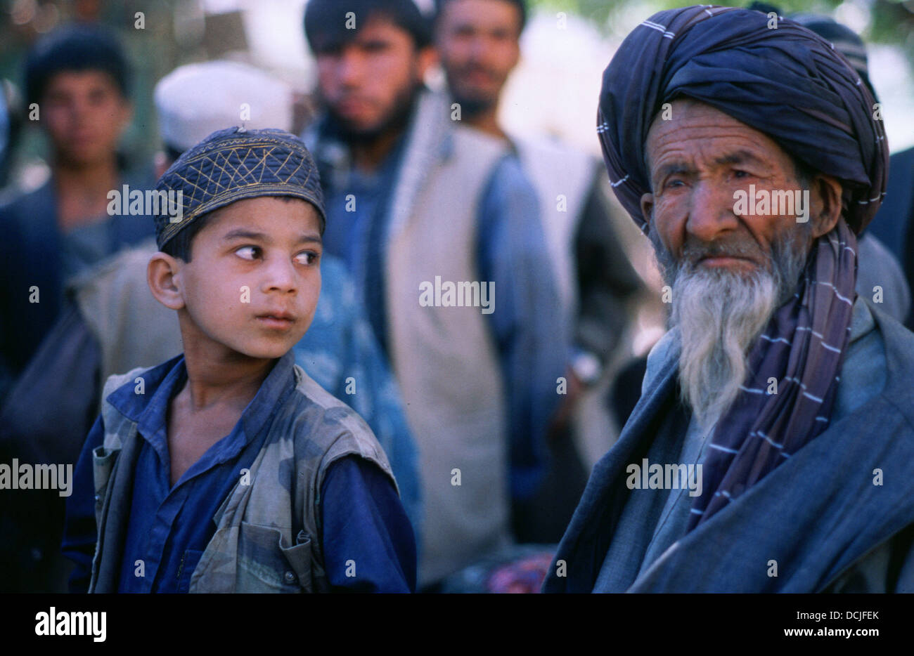 September 1999 Panjshir Valley Afghanistan A Young Afghan Boy Looks At His Grandfather After They Had Fled A Taliban Assault On Their Village In Shamali Valley Just North Of Kabul As Refugees