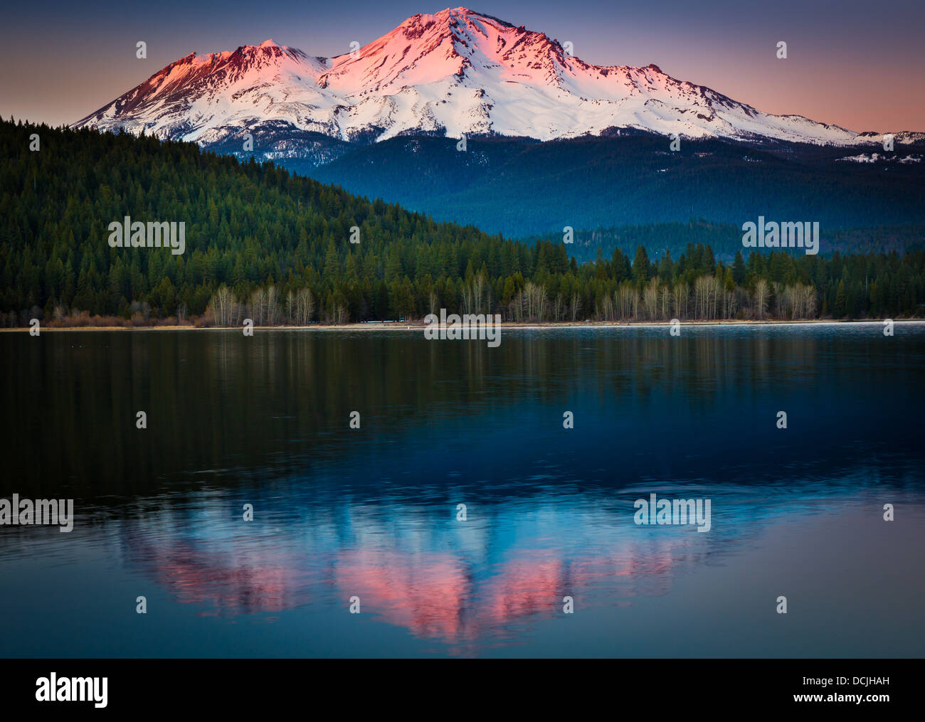 Mount Shasta reflecting in nearby Lake Siskiyou, California Stock Photo