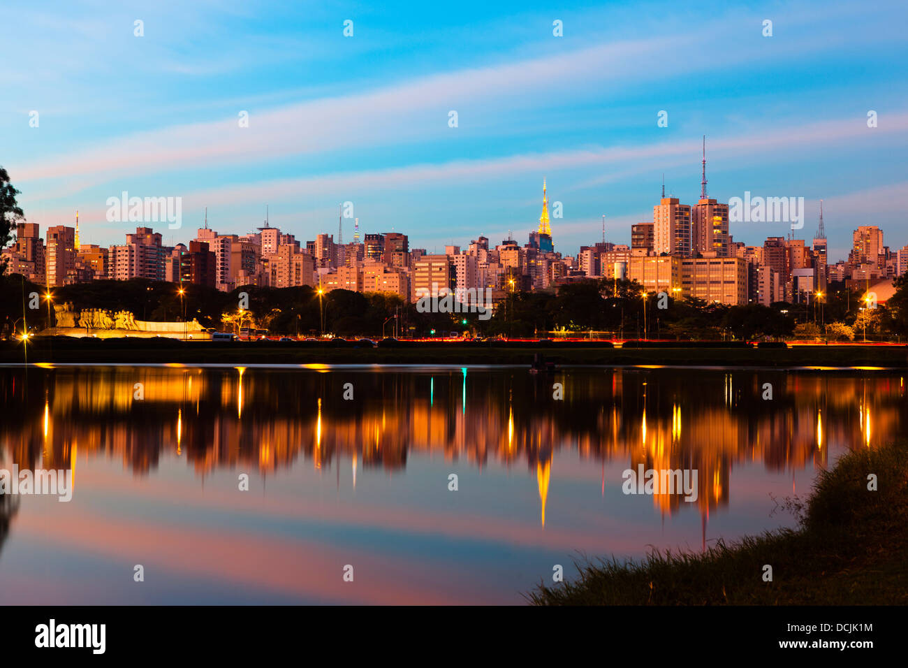 Sao Paulo skyline at sunset seen from Ibirapuera Park ( Parque Ibirapuera) a major urban park of the city, Brazil. Stock Photo