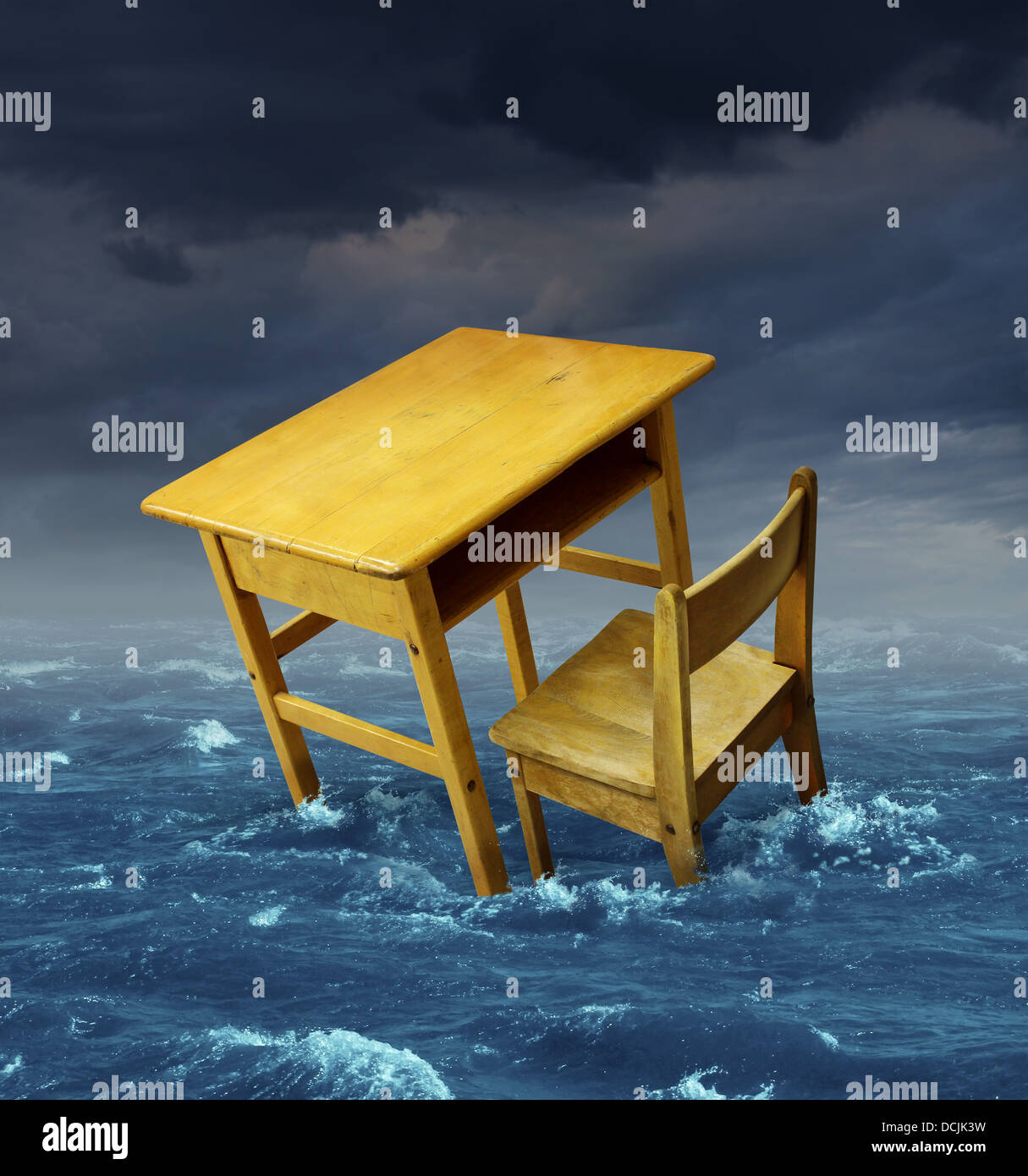Education problems concept with an old school desk drowning in the water during a storm as a symbol of inaccessible schooling and funding challenges for special learning and literacy programs for underprivileged poor students. Stock Photo
