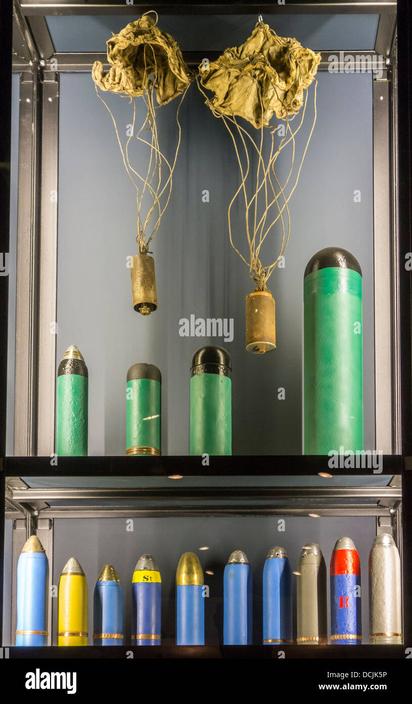 First World War One artillery ammunition showing WWI bombs on parachutes and colorful grenades, Memorial Museum Passchendaele Stock Photo