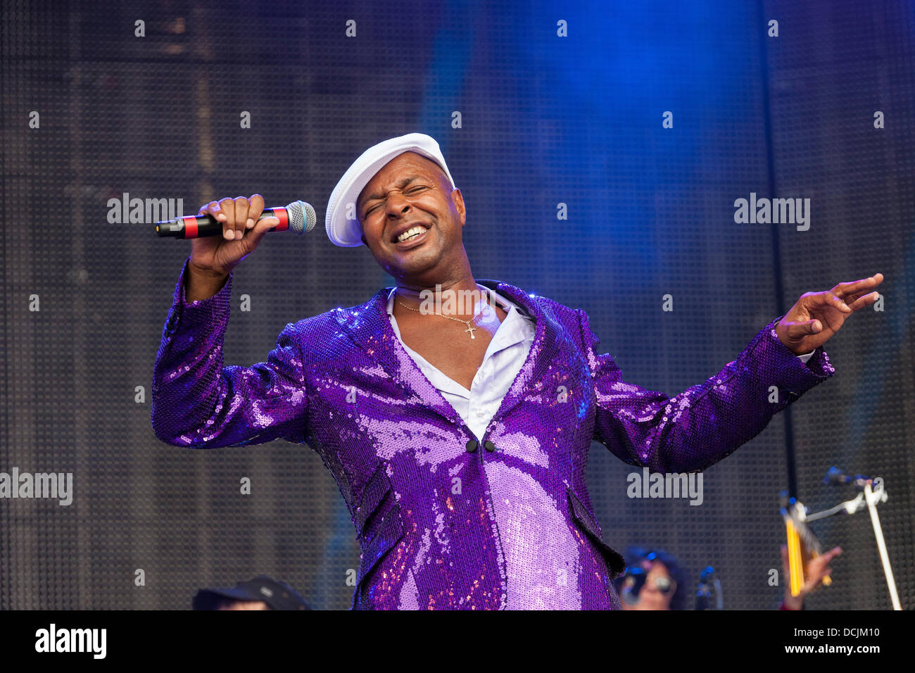 Remenham, Henley-on-Thames, Oxfordshire, UK. 18 August 2013. Singer LEE JOHN performs on-stage as part of the British soul and funk band IMAGINATION at the 2013 'REWIND - The 80s Festival' held 16-17-18 August 2013. Photograph © 2013 John Henshall/Alamy Live News. PER0371 Stock Photo