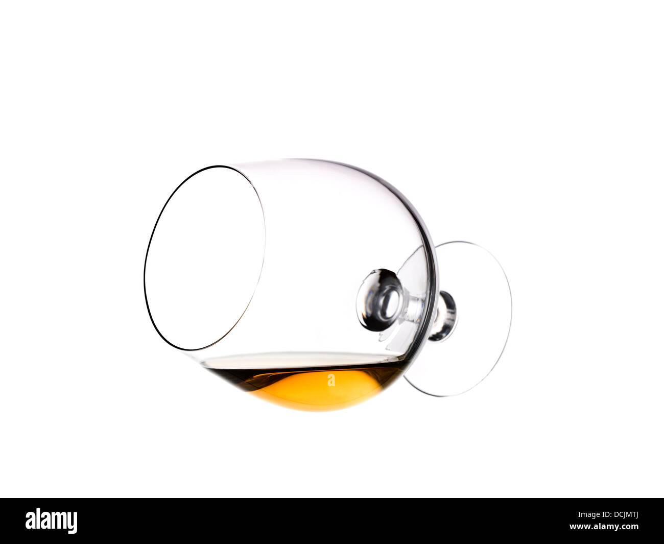 Lieing glass of brandy Stock Photo Alamy