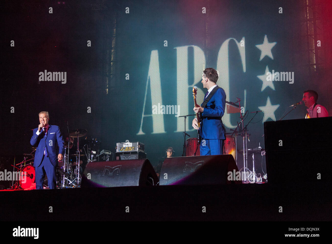 Remenham, Henley-on-Thames, Oxfordshire, UK. 18 August 2013. Lead singer MARTIN FRY (left) of the English new-wave band ABC performs on-stage at the 2013 'REWIND - The 80s Festival' held 16-17-18 August 2013. Photograph © 2013 John Henshall/Alamy Live News. PER0378 Stock Photo