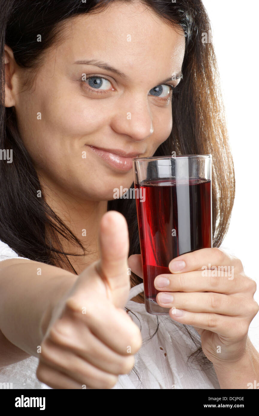Cherry juice is consumed from a glass Stock Photo Alamy