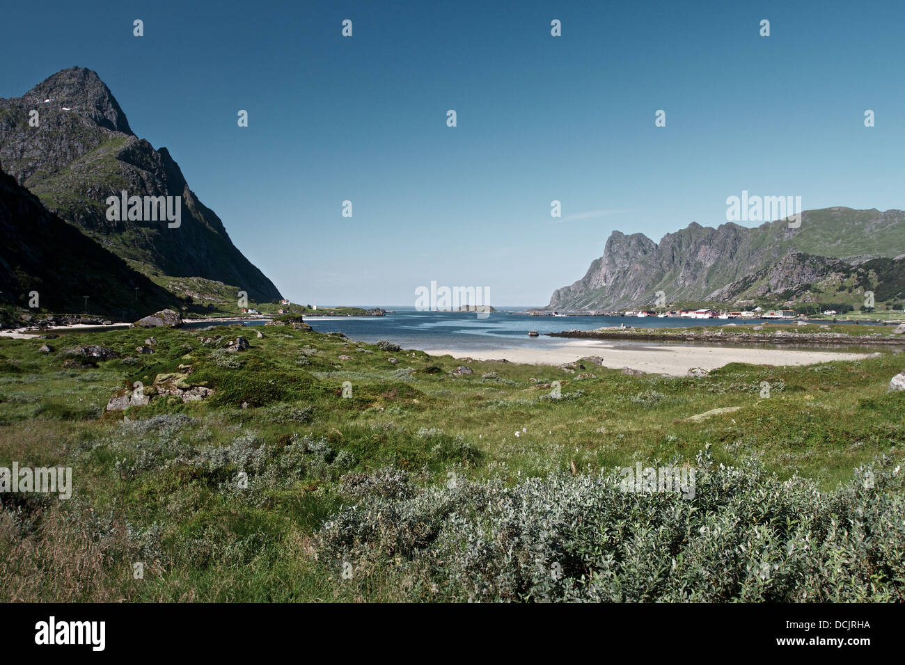 Norwegian mountain with meadow and beach foreground Stock Photo