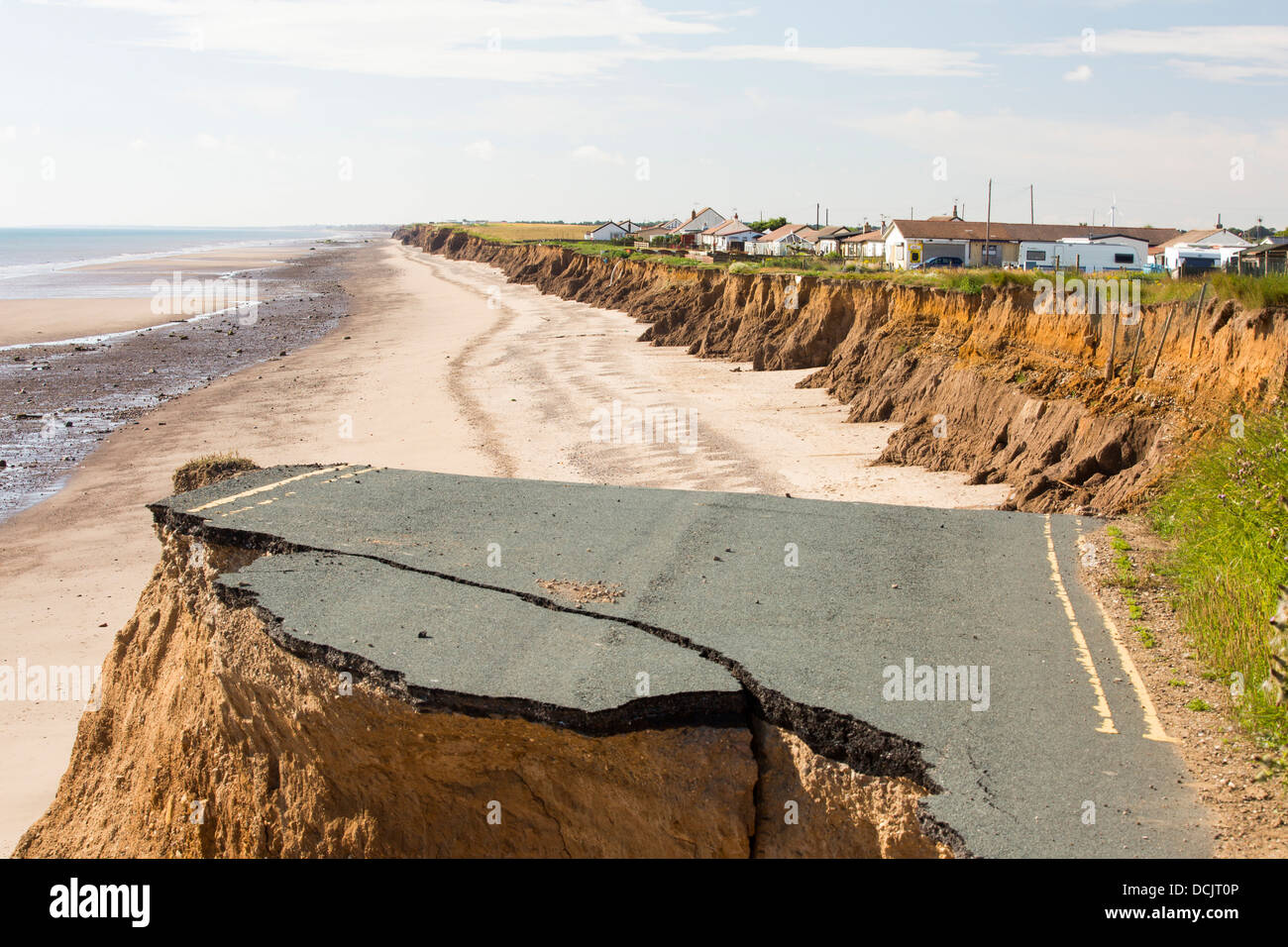 A collapsed coastal road at between Skipsea and Ulrome on Yorkshires East Coast, near Skipsea, UK. Stock Photo