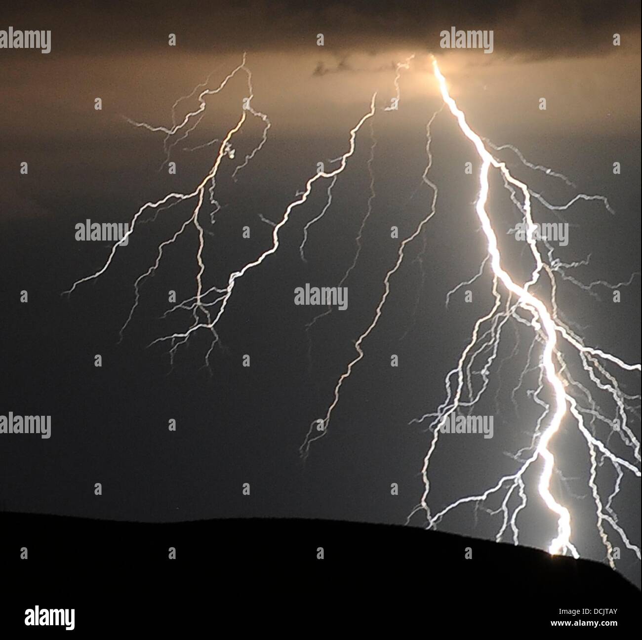 Barstow CA., USA. 19th Aug, 2013. Lightning strikes and thunder and