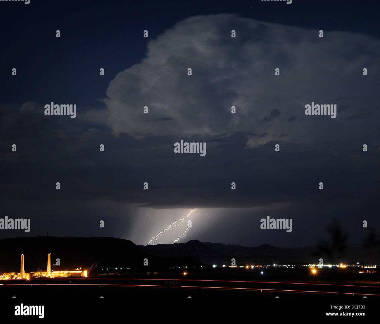 Barstow CA., USA. 19th Aug, 2013. Lightning strikes and thunder and
