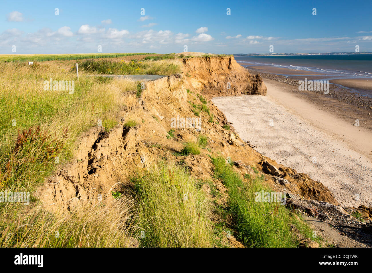 A collapsed coastal road at between Skipsea and Ulrome on Yorkshires East Coast, near Skipsea, UK. Stock Photo