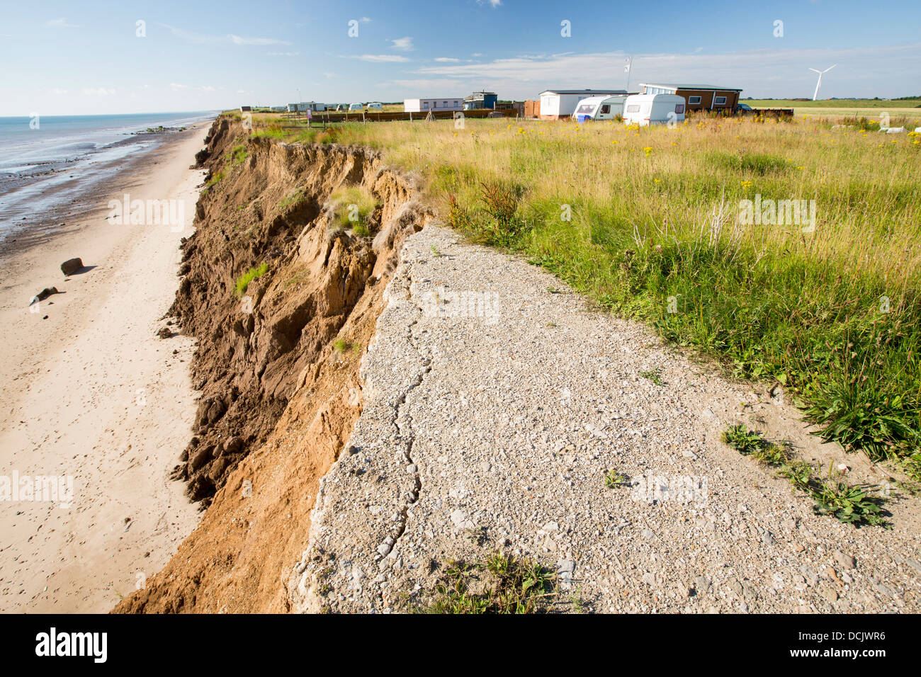 A collapsed coastal road at between Skipsea and Ulrome on Yorkshires East Coast, near Skipsea, UK. Stock Photo