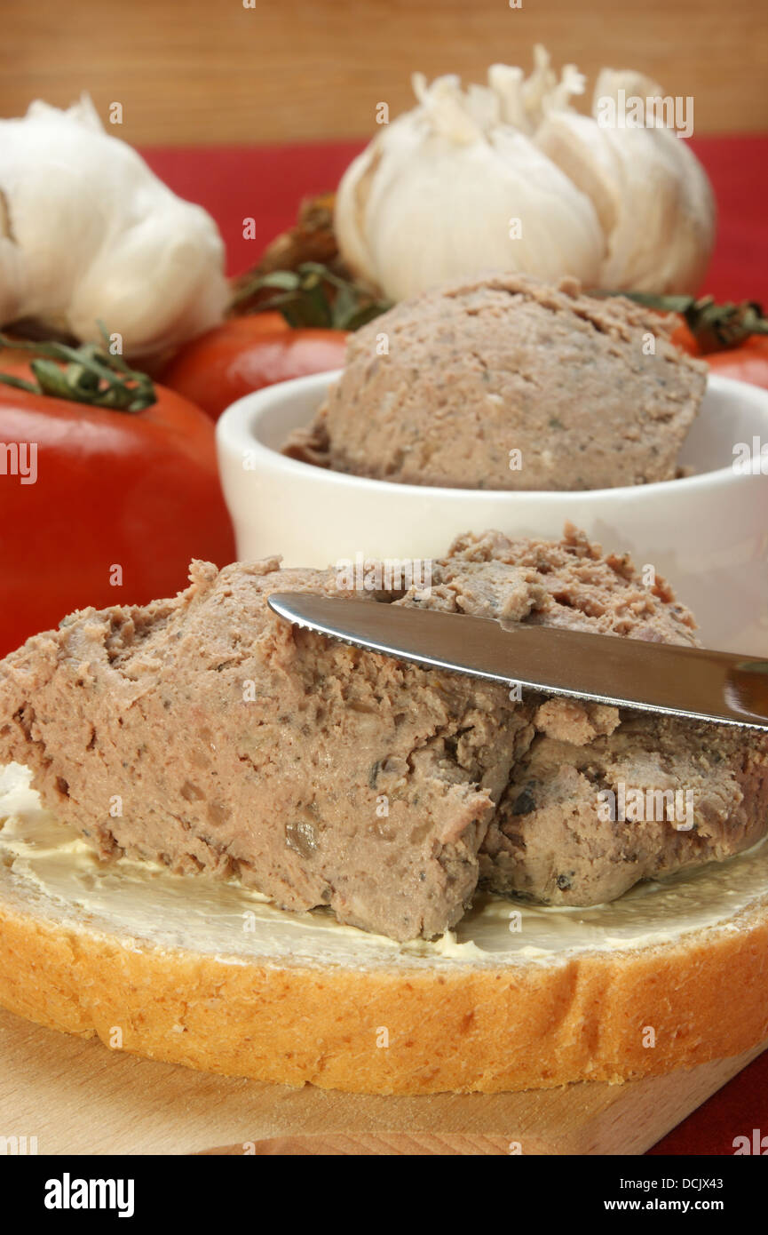 Liver sausage with marjoram on a slice of bread Stock Photo Alamy
