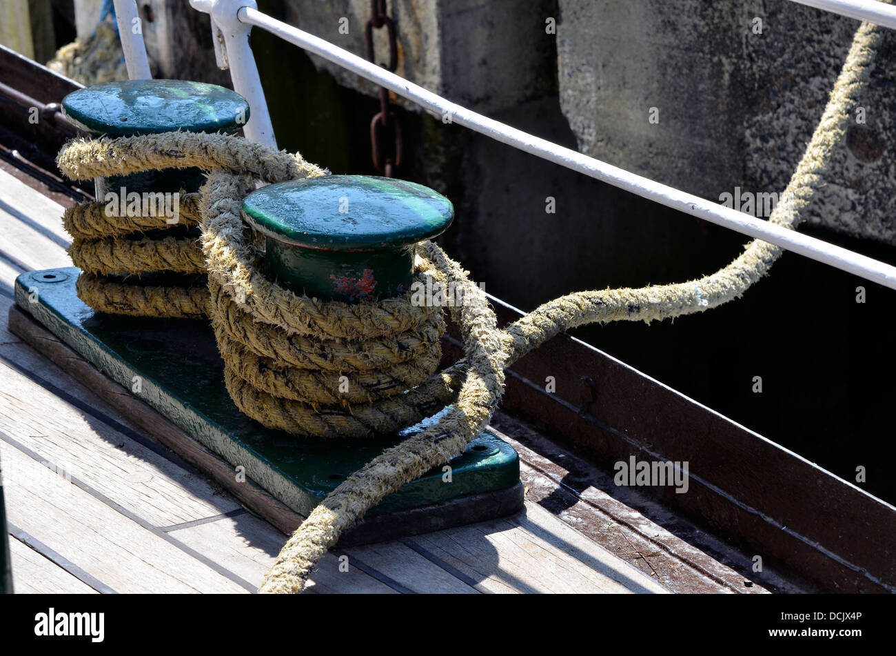 Mooring stanchions with ropes tied on the deck of a Windermere steamer. Stock Photo