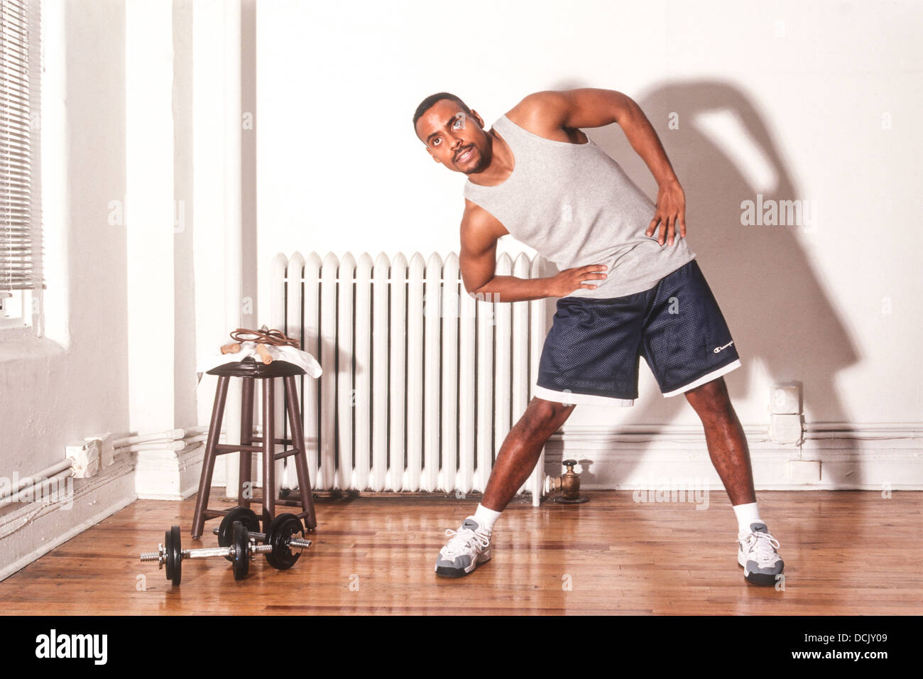 Black male stretching before work out. Stock Photo