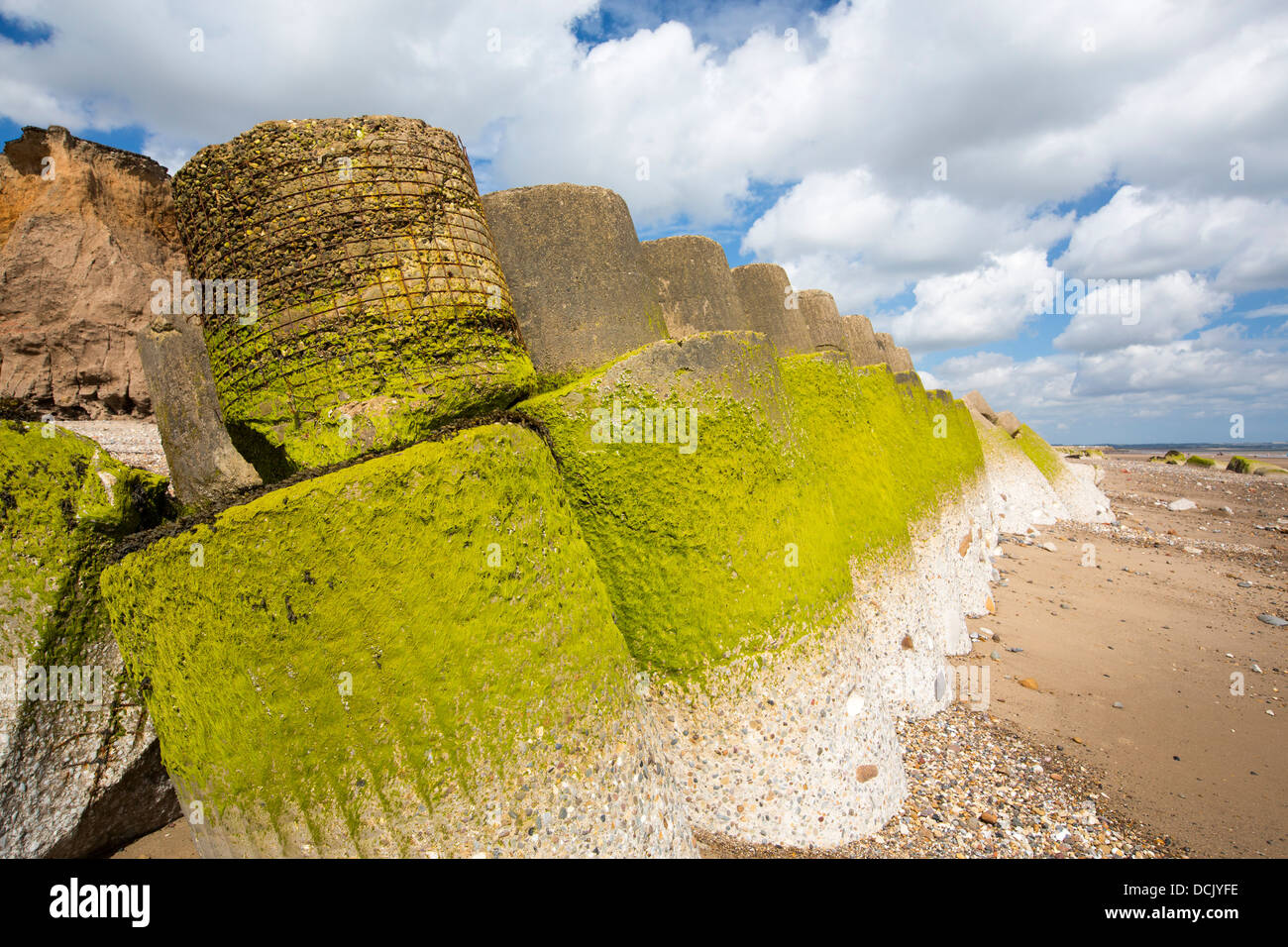 Smashed concrete sea defences at Ulrome near Skipsea on Yorkshires East Coast, UK. Stock Photo
