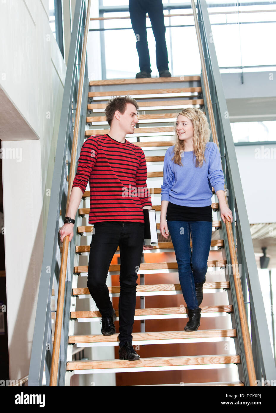 Man woman stairs hi-res stock photography and images - Alamy