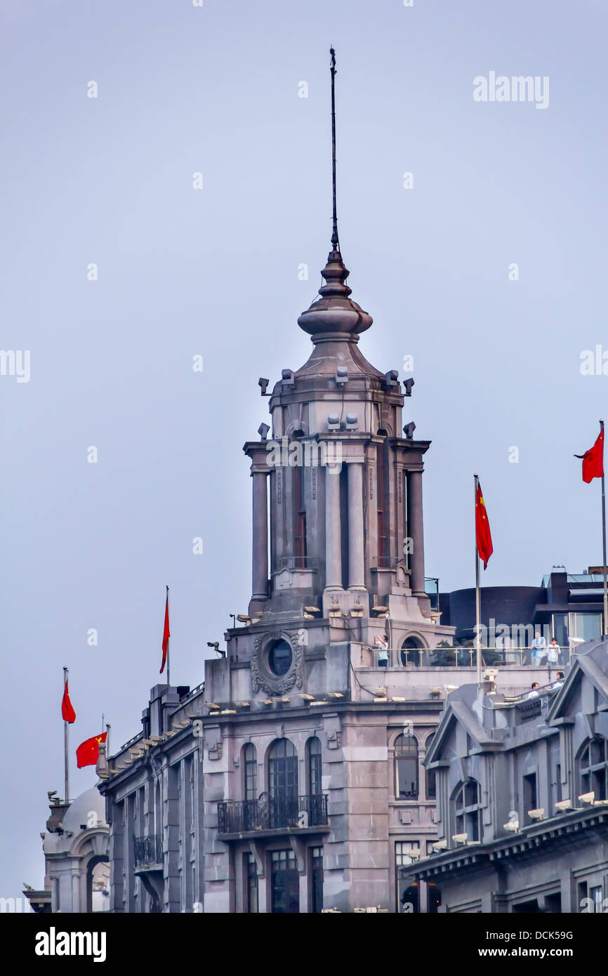 Old Shanghai Building Tower Flags The Bund, Old Part of Shanghai China Stock Photo