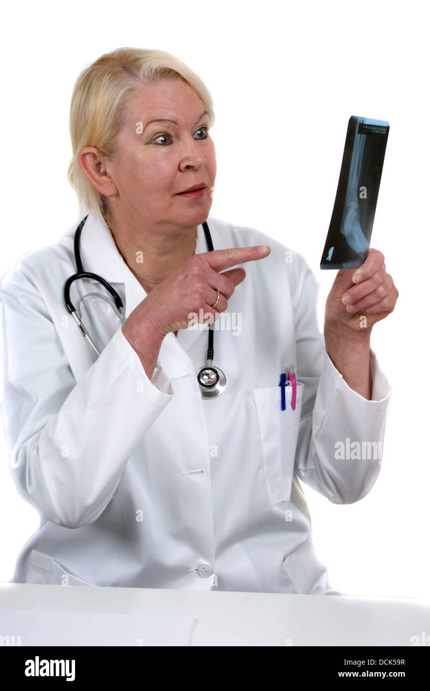 medical assistant holds an xray image for review Stock Photo Alamy