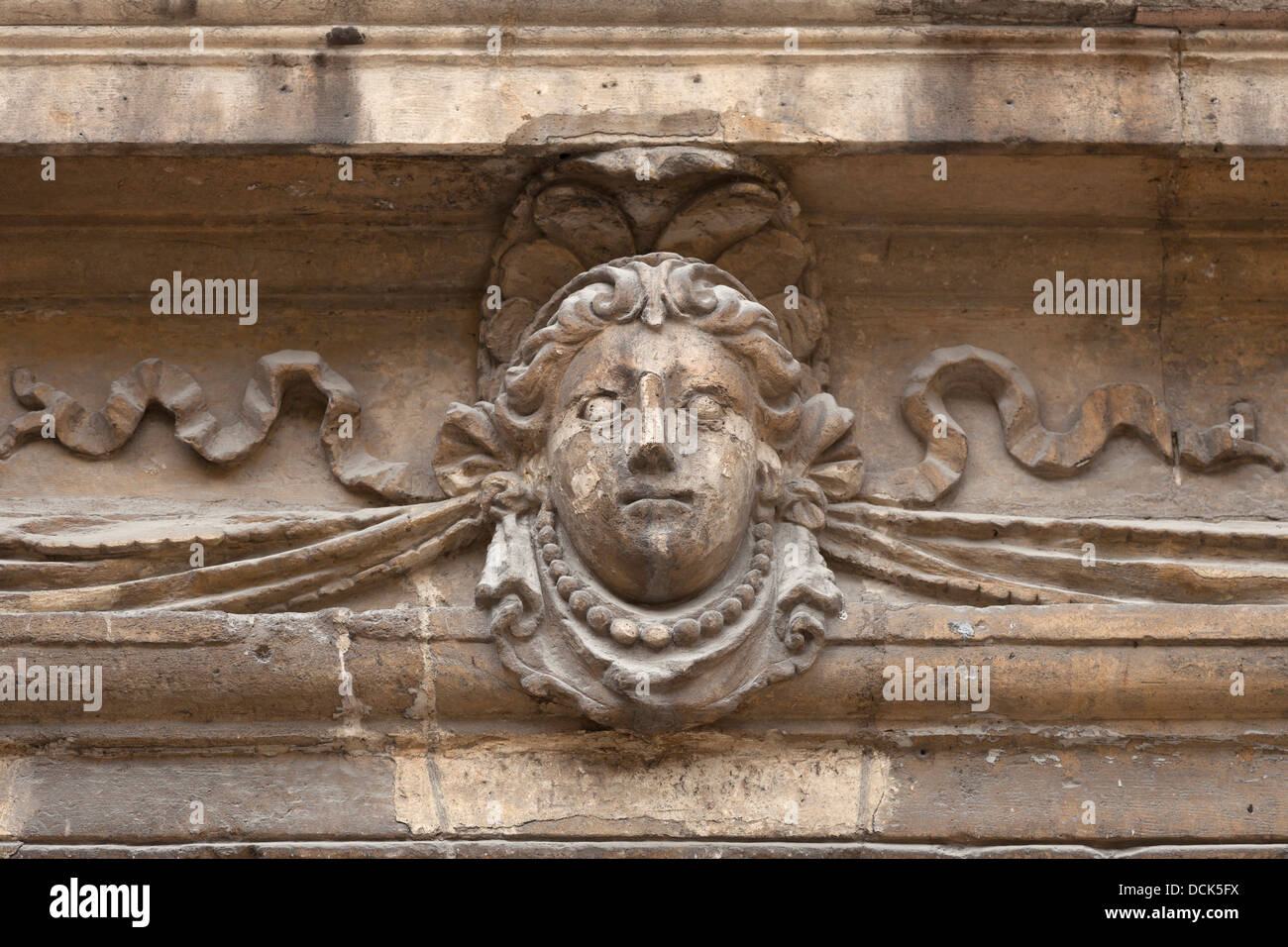 Relief sculpture at 17th century Hôtel de Sully (former home of duc de Sully), Marais district, Paris, France Stock Photo