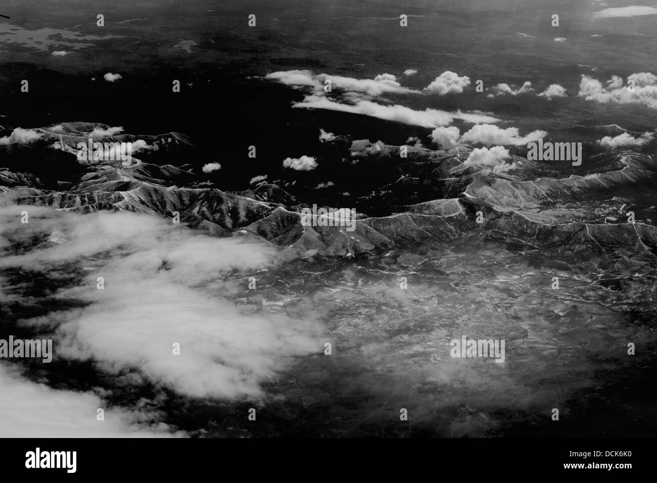 Aerial view of snowy mountains seen from a plane Stock Photo - Alamy
