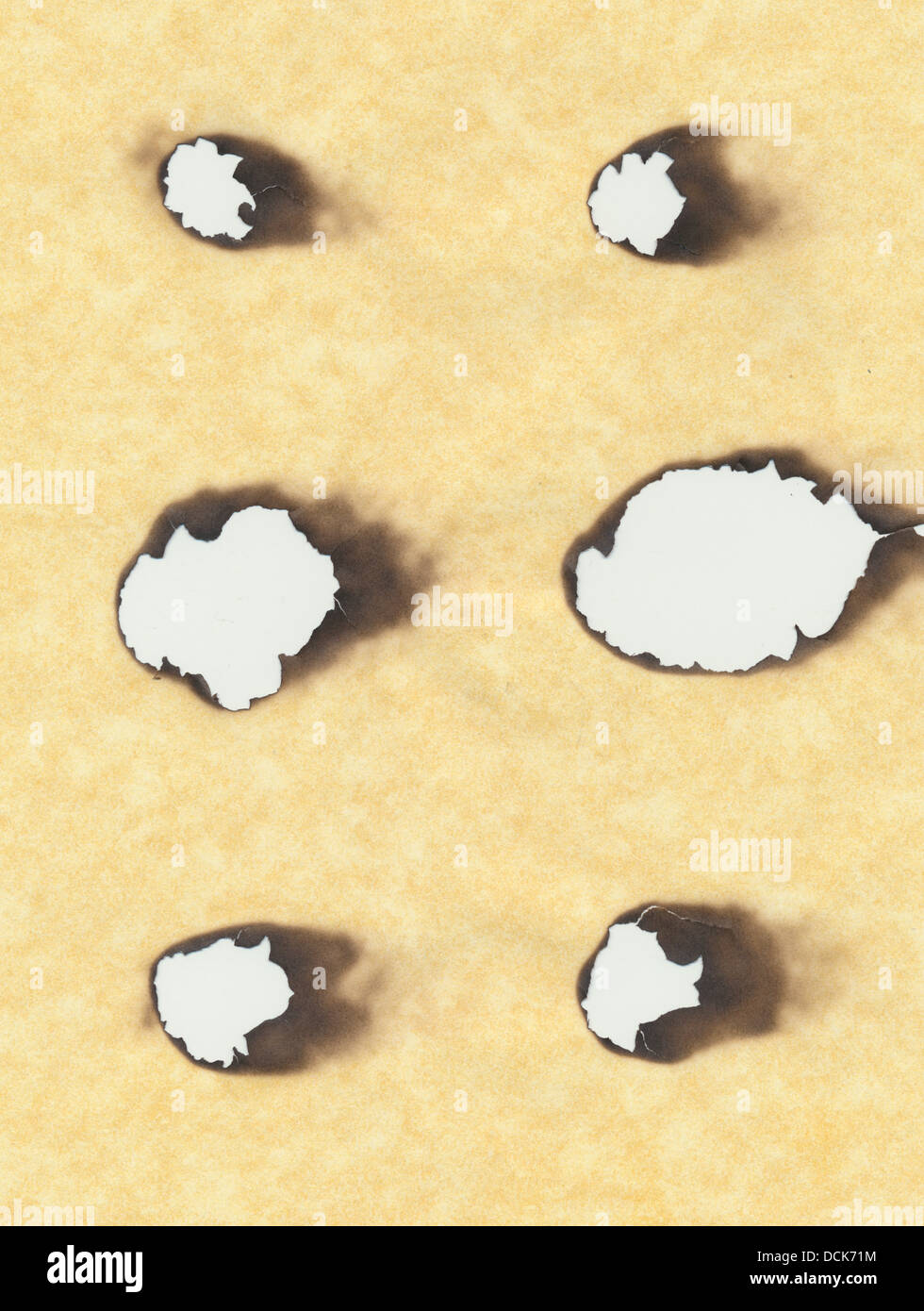 combustion hole in paper Stock Photo