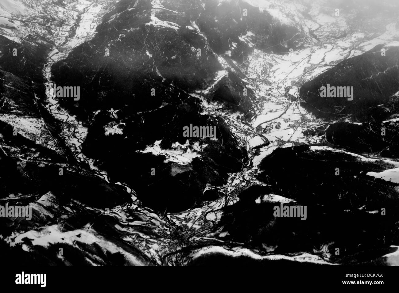 Aerial view of snowy mountains seen from a plane Stock Photo - Alamy