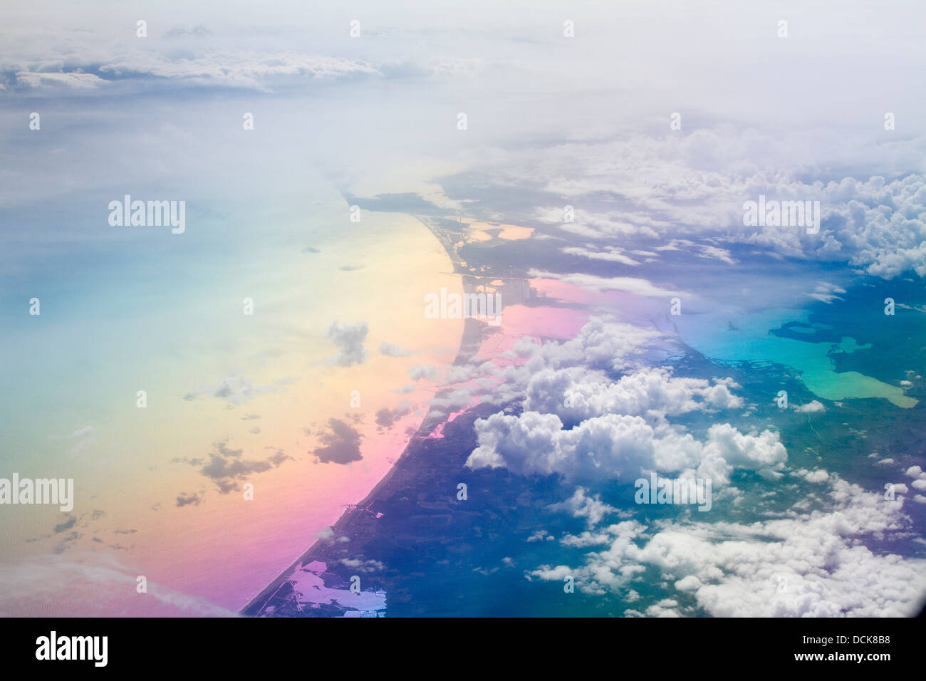 Aerial view of lake and white clouds seen from a plane Stock Photo - Alamy