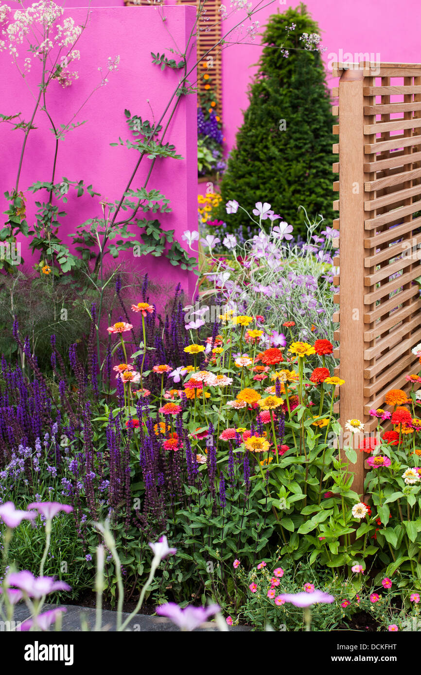 Modern garden with original pink walls Stock Photo Alamy
