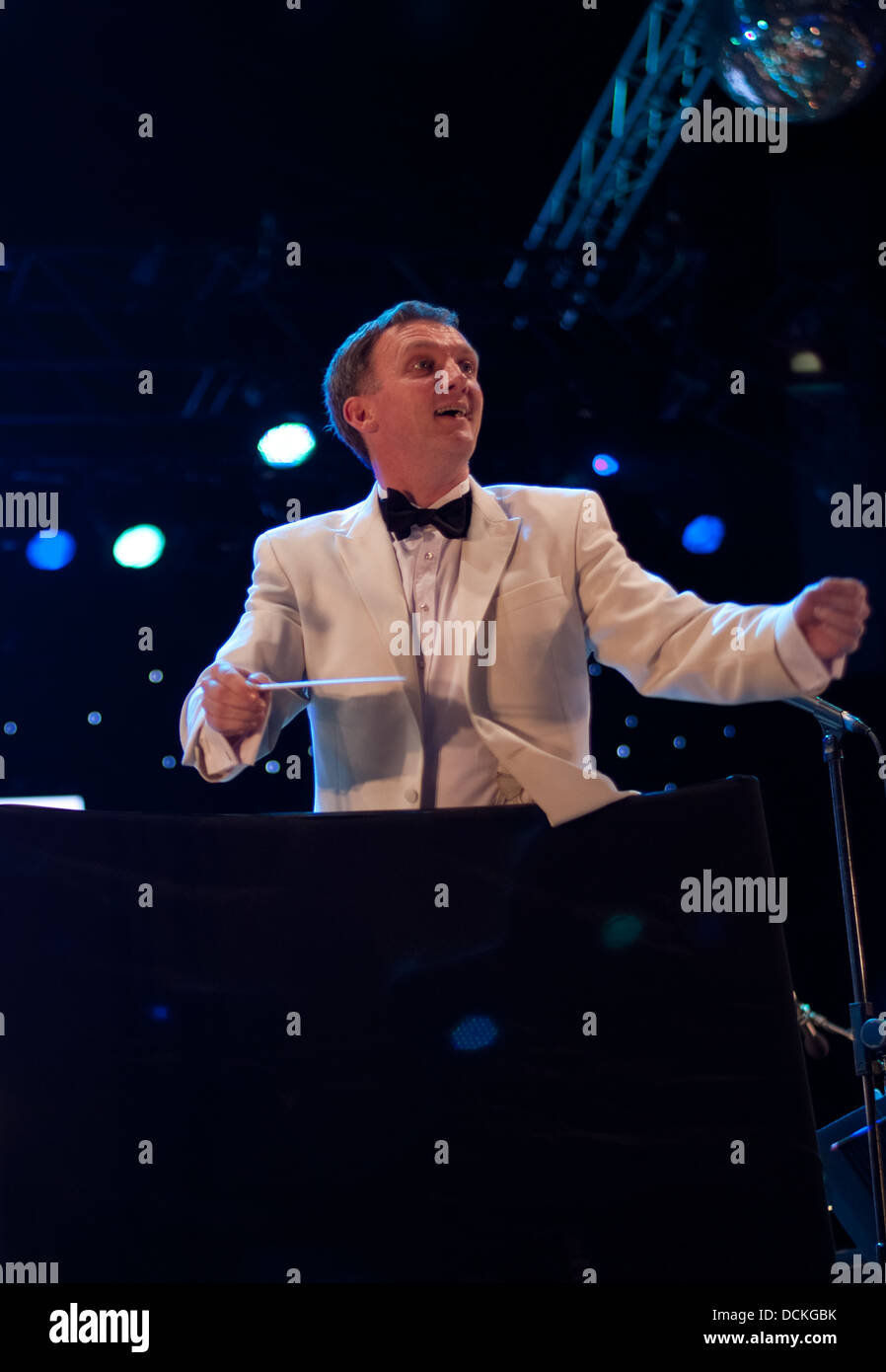John Rigby conducting on his third year at Under the Stars, The Classical night of the Under the Stars series is the final night Stock Photo