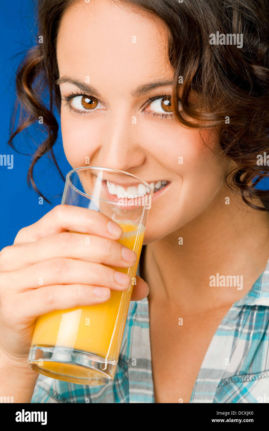 Woman drinking juice Stock Photo Alamy