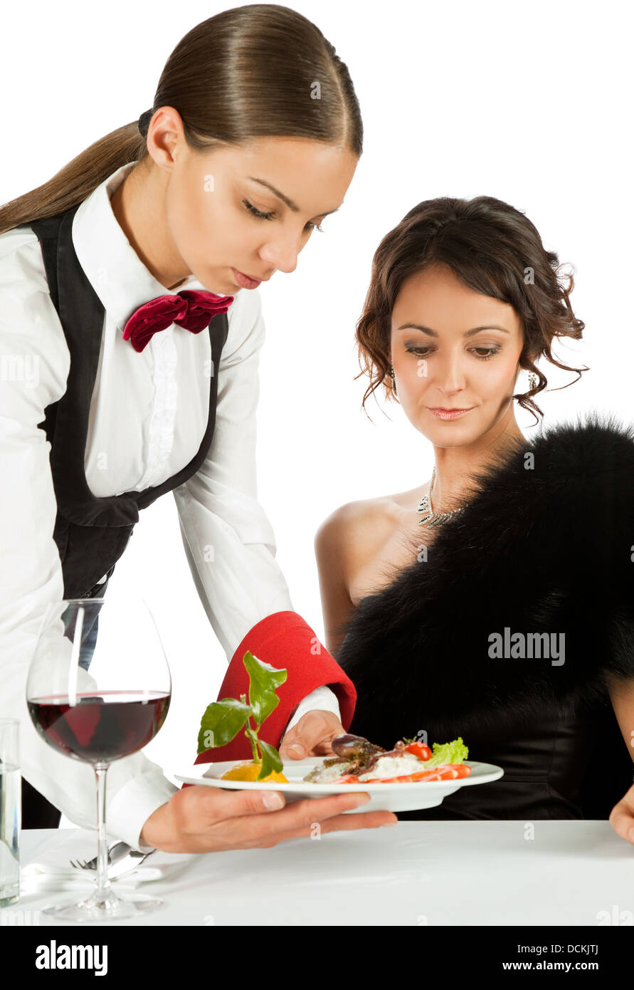 Waitress serving to beautiful female Stock Photo Alamy