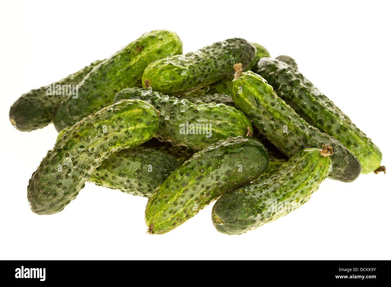 bunch small cucumbers isolated Stock Photo Alamy