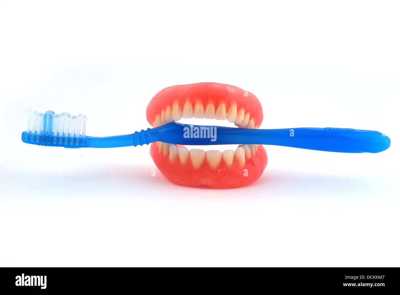 dentures and toothbrush Stock Photo - Alamy