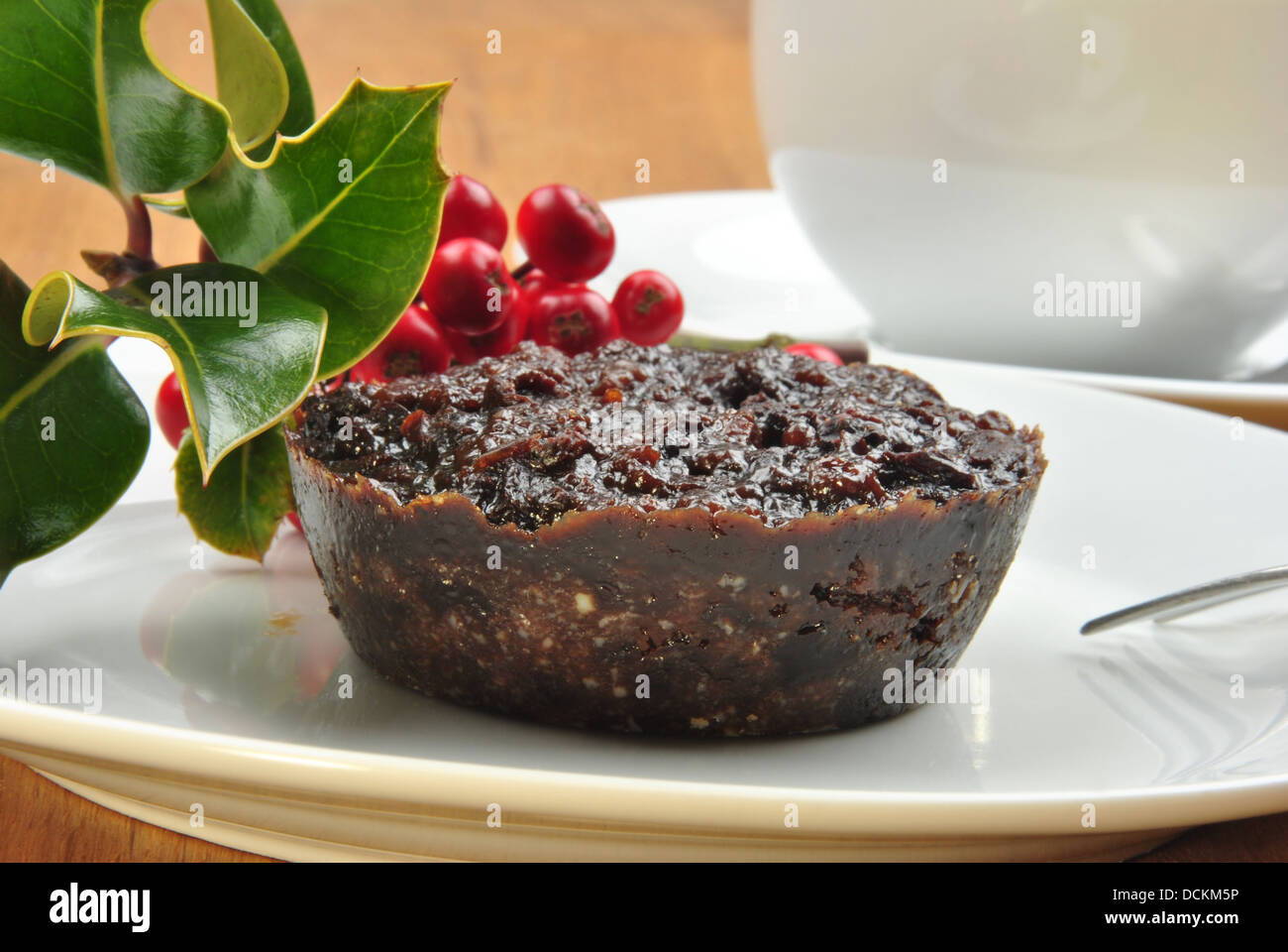 home made christmas pudding on a plate Stock Photo