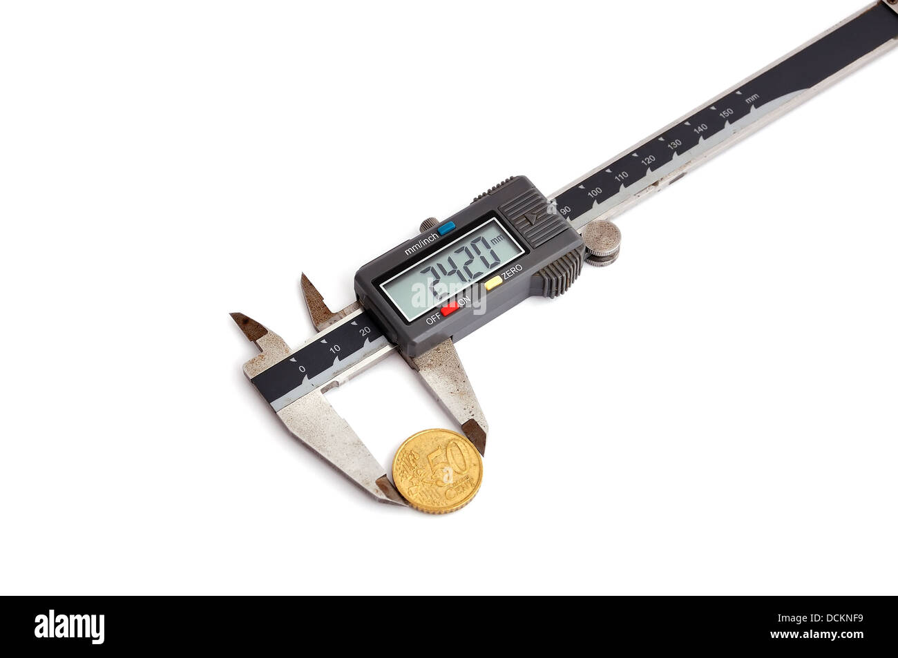 calipers and coin Stock Photo Alamy