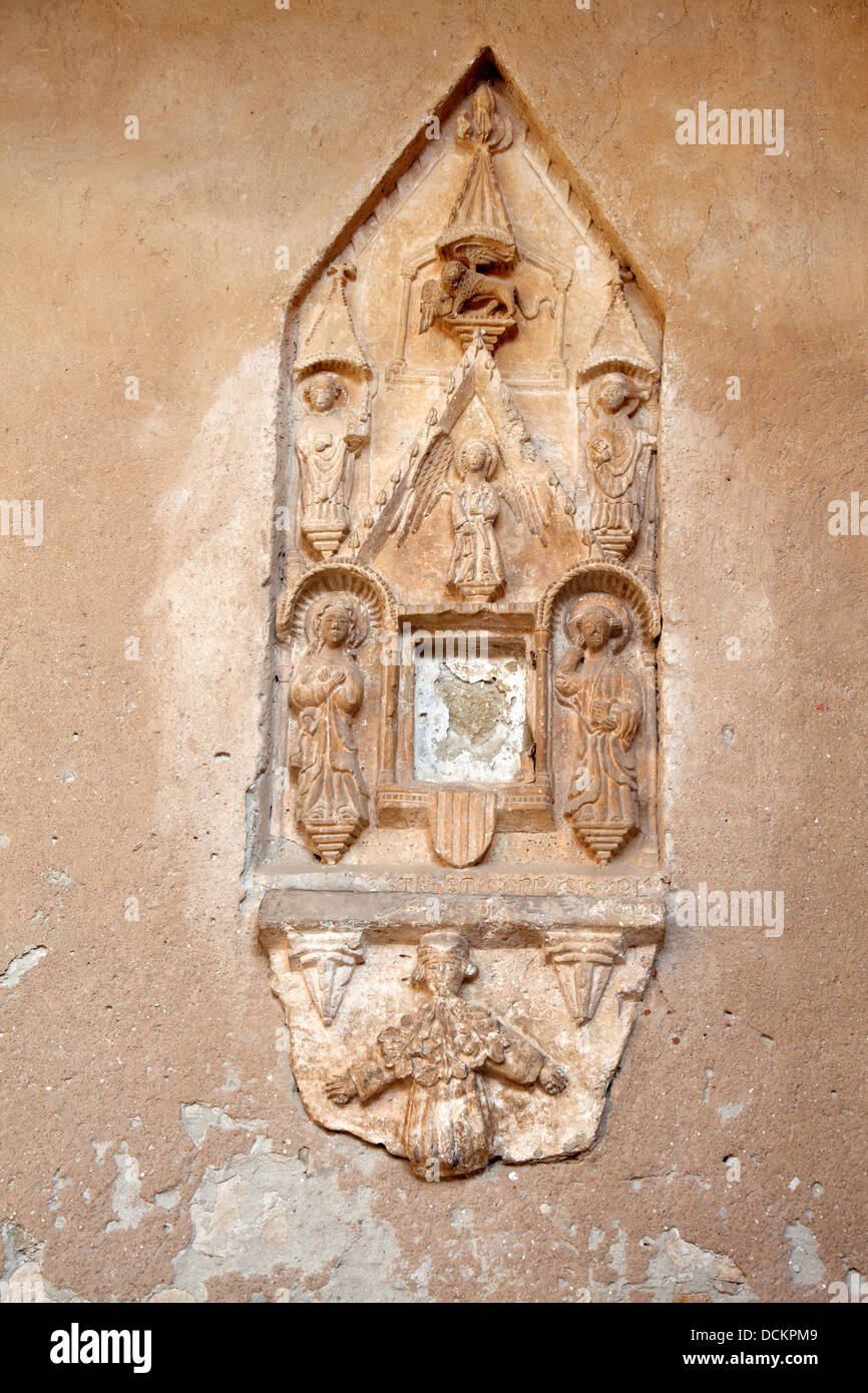 religious stone carving, on the wall Stock Photo