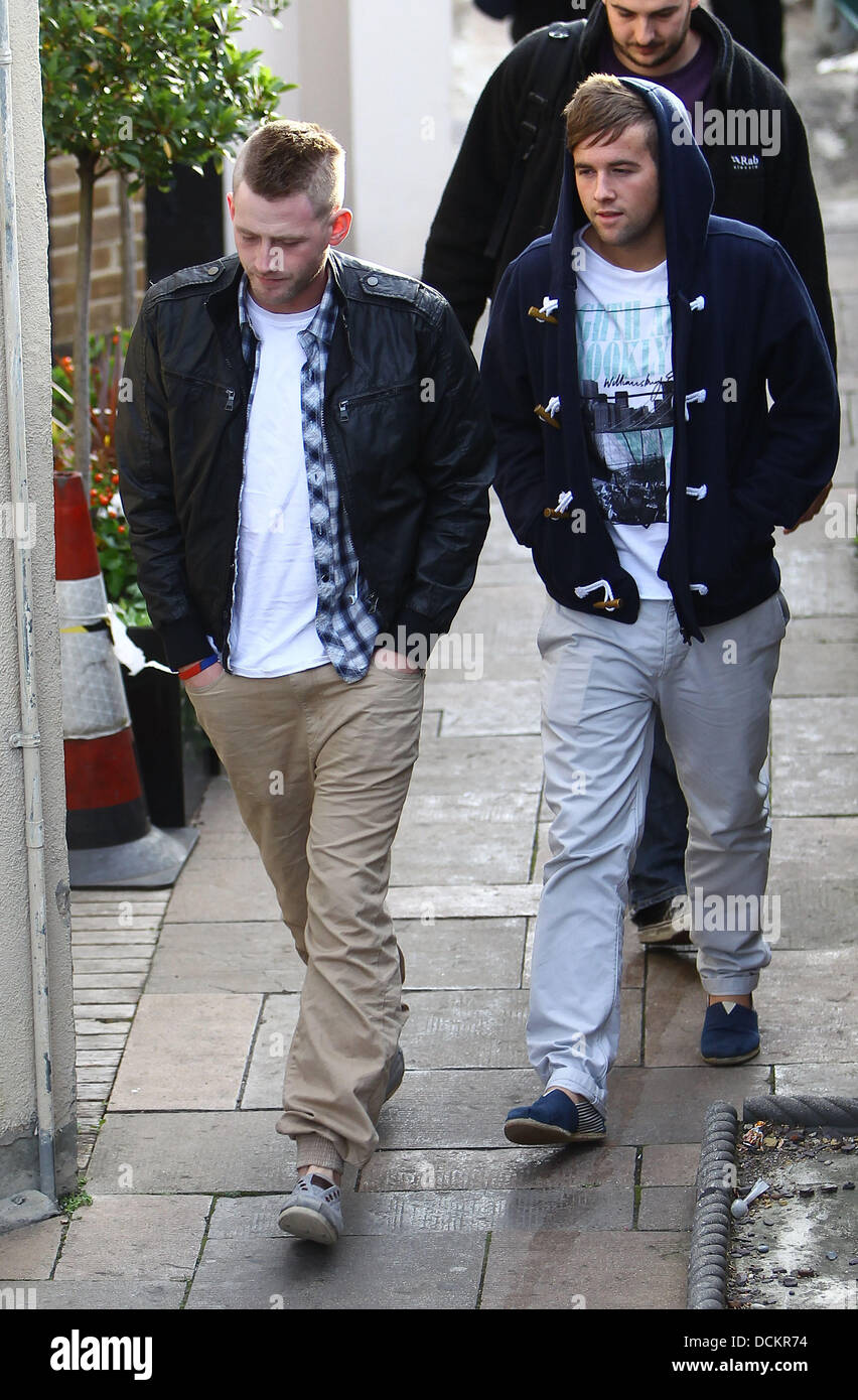 X factor finalists Jonjo Kerr and Andrew Merry from The Risk arrive at the X factor studios ahead of this weekends live shows London, England - 07.10.11 Stock Photo