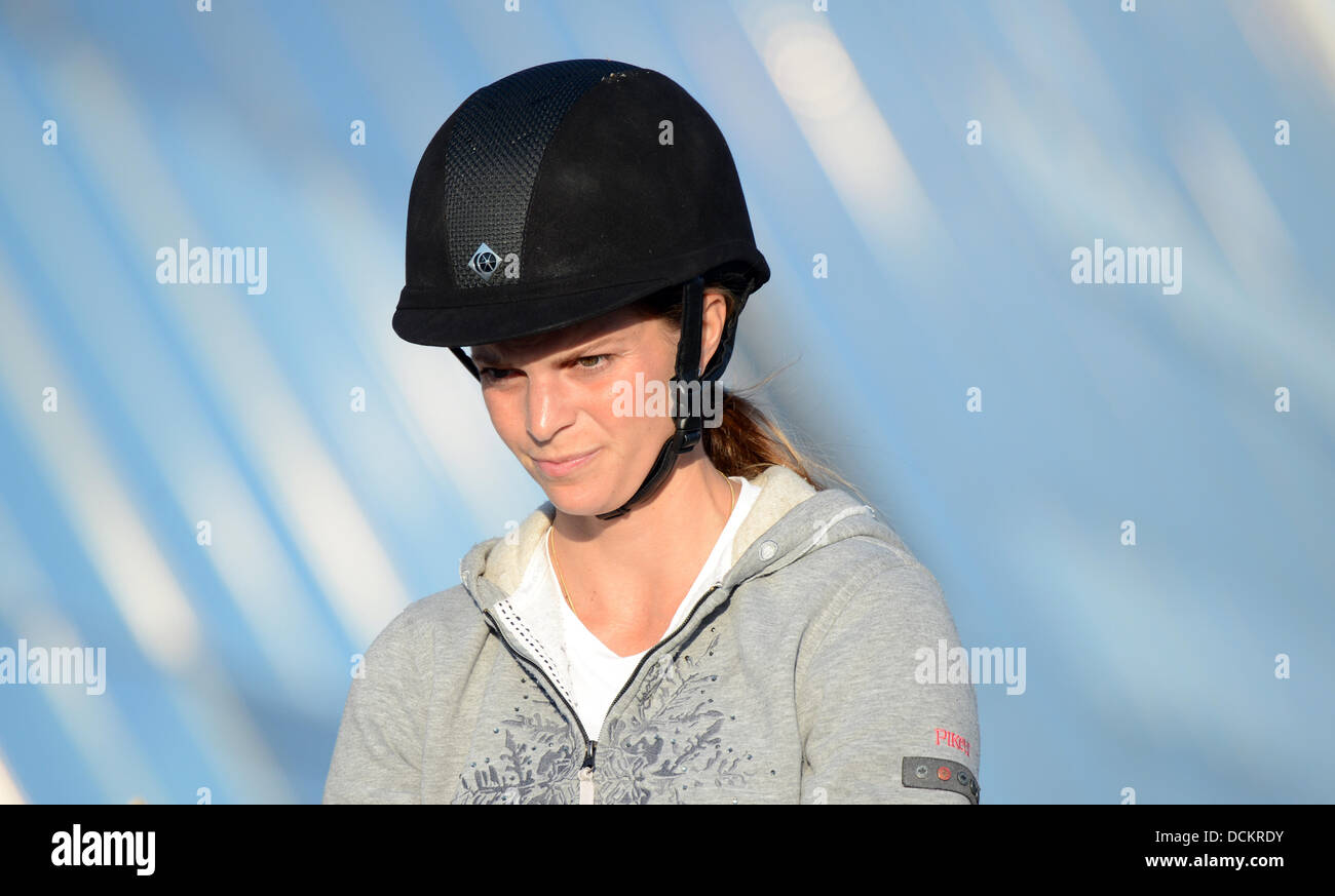 Herning, Denmark. 19th Aug, 2013. Greek show jumper Athina Onassis de Miranda is on her way to a training in the evening during the European Show Jumping and Dressage Championships in Herning, Denmark, 19 August 2013. Photo: JOCHEN LUEBKE/dpa/Alamy Live News Stock Photo