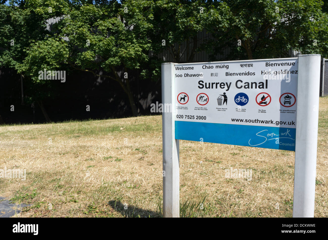 A multilingual sign for the Surrey Canal Linear Park at Peckham in south London. Stock Photo