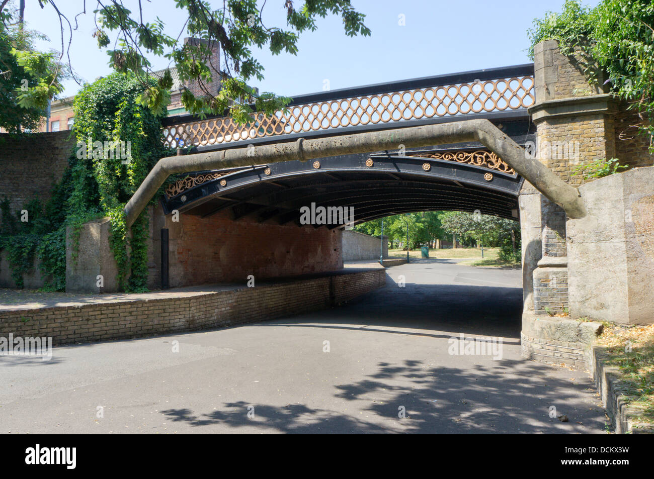 The Commercial Way road bridge over the old Surrey Canal at Peckham in south London, now a linear park. Stock Photo