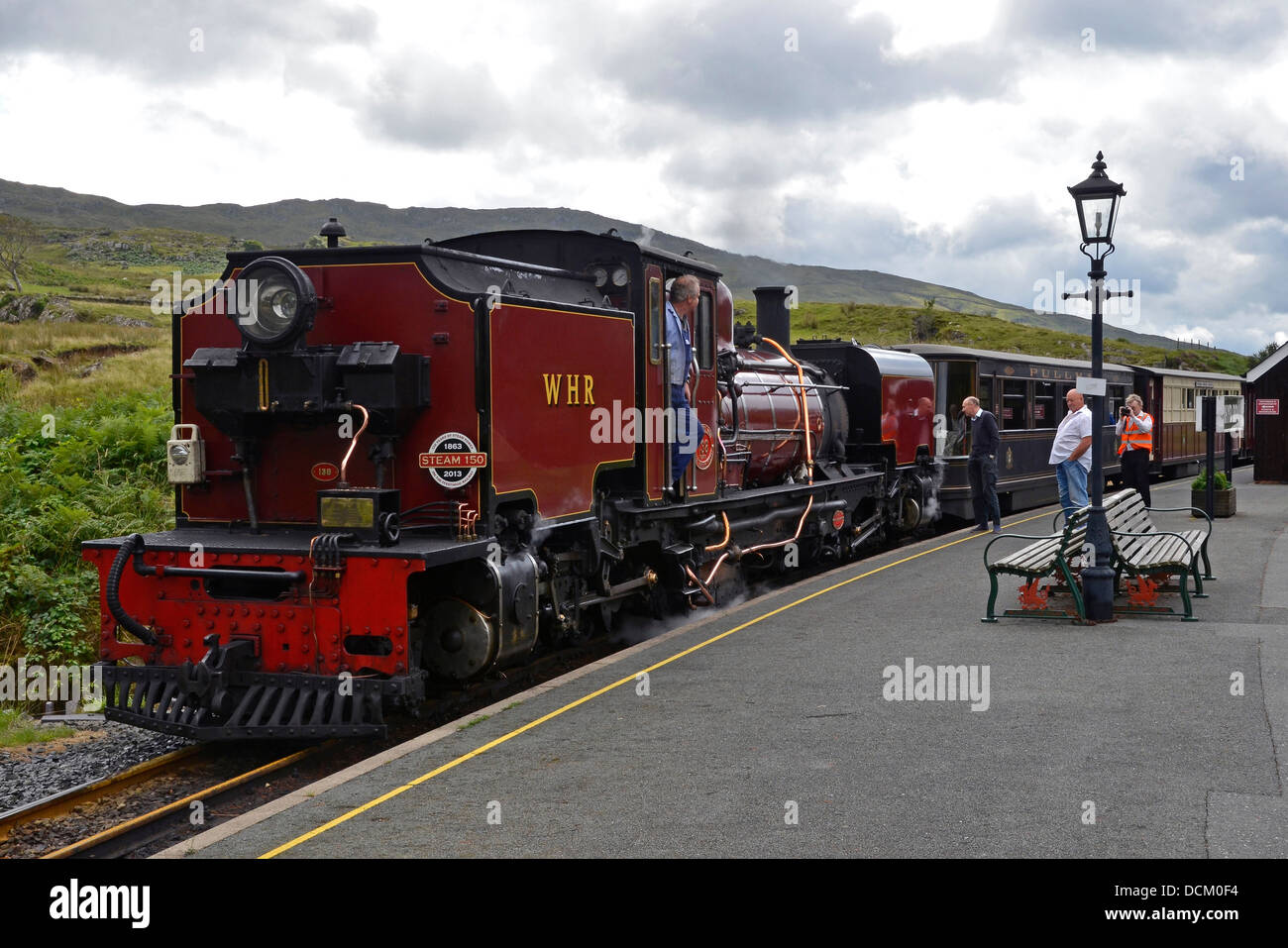 Welsh Highland Railway Beyer-Garratt steam loco (ex SAR) at Rhydd Ddu station in Snowdonia with a train to Caernarfon. Stock Photo