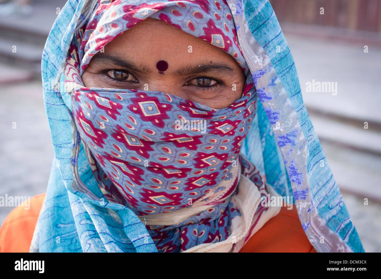 Indian woman with bindi outside Amber ( Amer ) Fort / Palace - Jaipur, Rajasthan, India Stock Photo