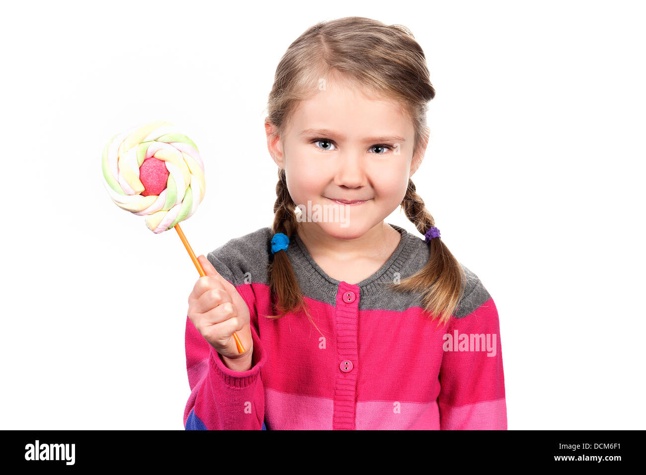 Cute girl with lollipop isolated on white background Stock Photo