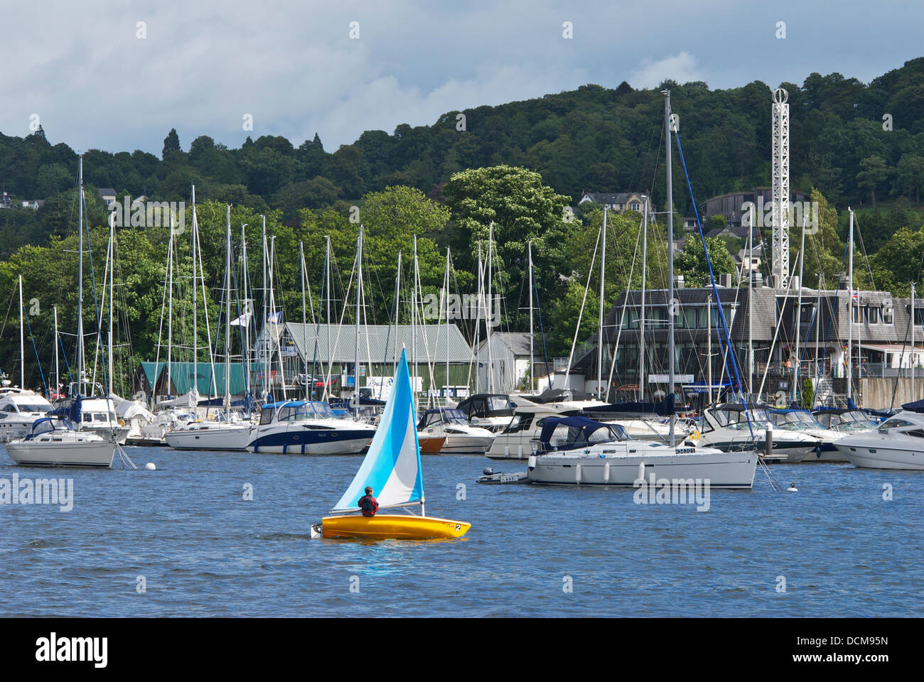 Boy in small sailing boat, Bowness Bay, Lake Windermere, Lake District National Park, Cumbria