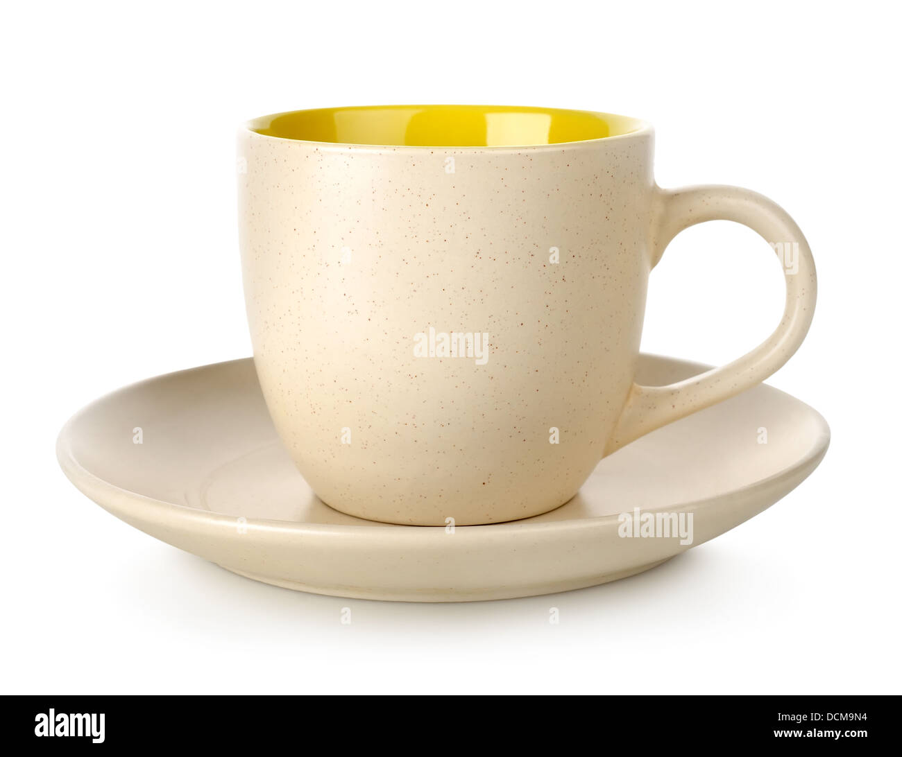 Yellow cup and saucer Stock Photo Alamy