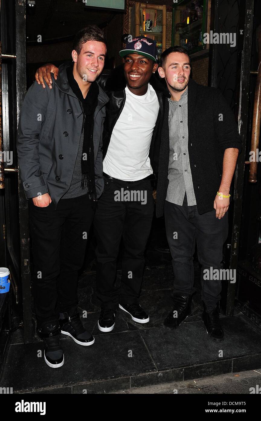 X Factor finialists Andrew Merry,Derry Mensah and Charlie Healy of The Risk  at Mahiki Club and McDonald's London, England - 20.10.11 Stock Photo