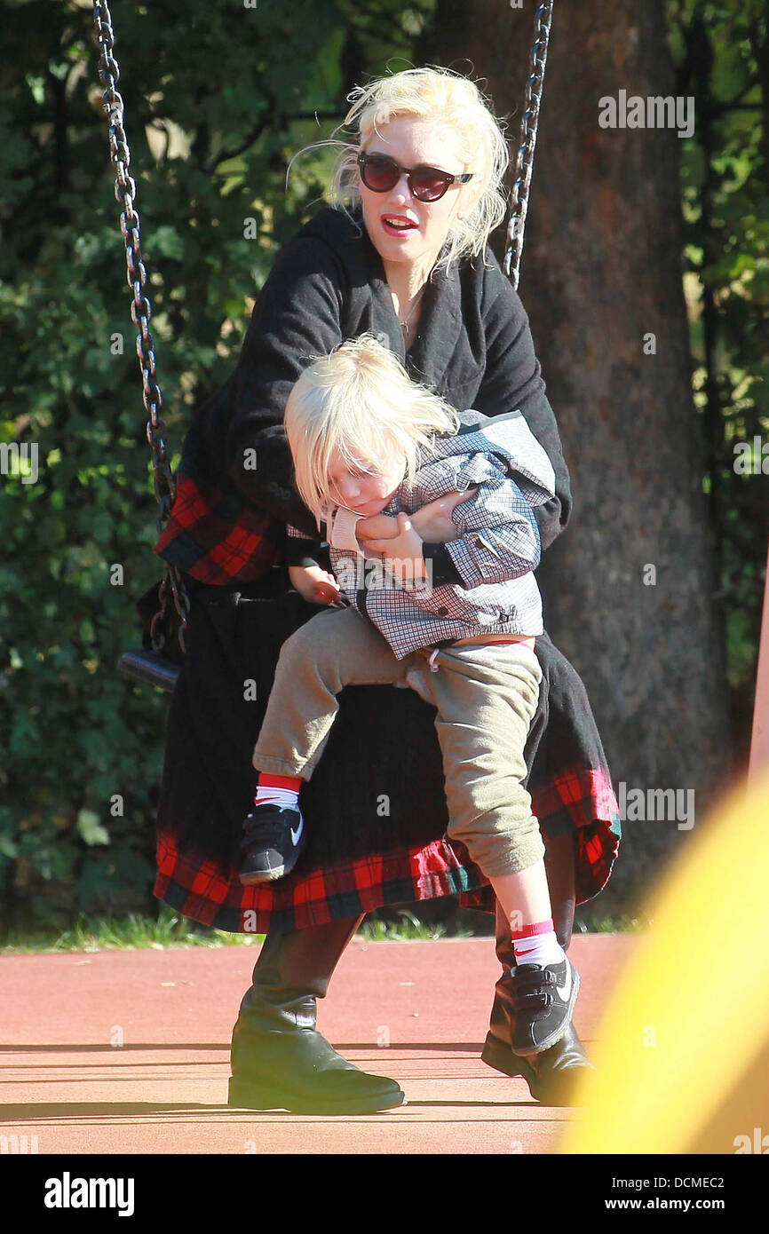 Gwen Stefani plays on the swings with her son Zuma at Primrose Hill