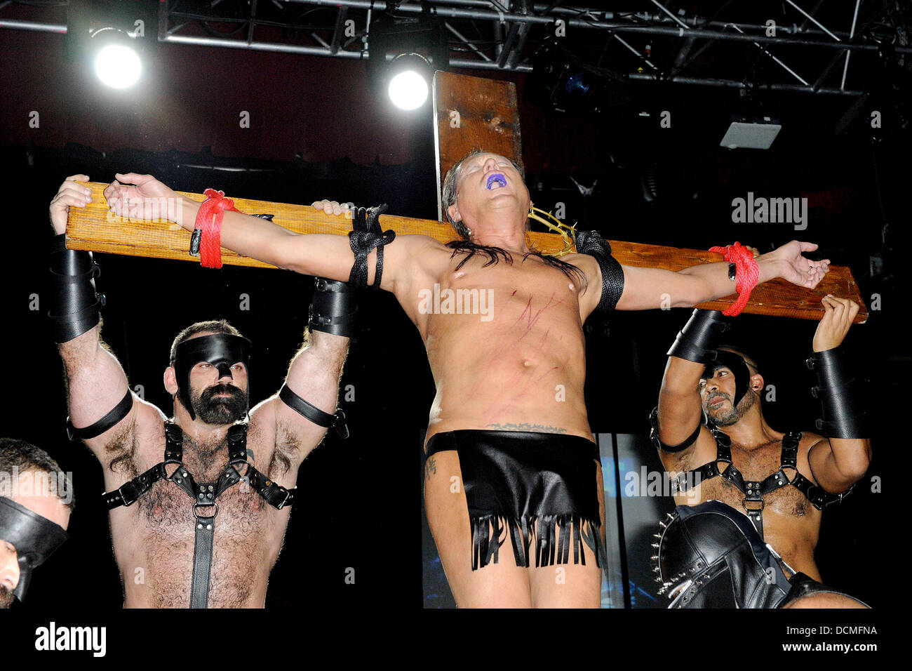 Demonstration of human crucifixion with real piercing 'Rapture' -  Northbound Leather annual fetish show and party at the Sound Academy.  Toronto, Canada - 22.10.11 Stock Photo - Alamy