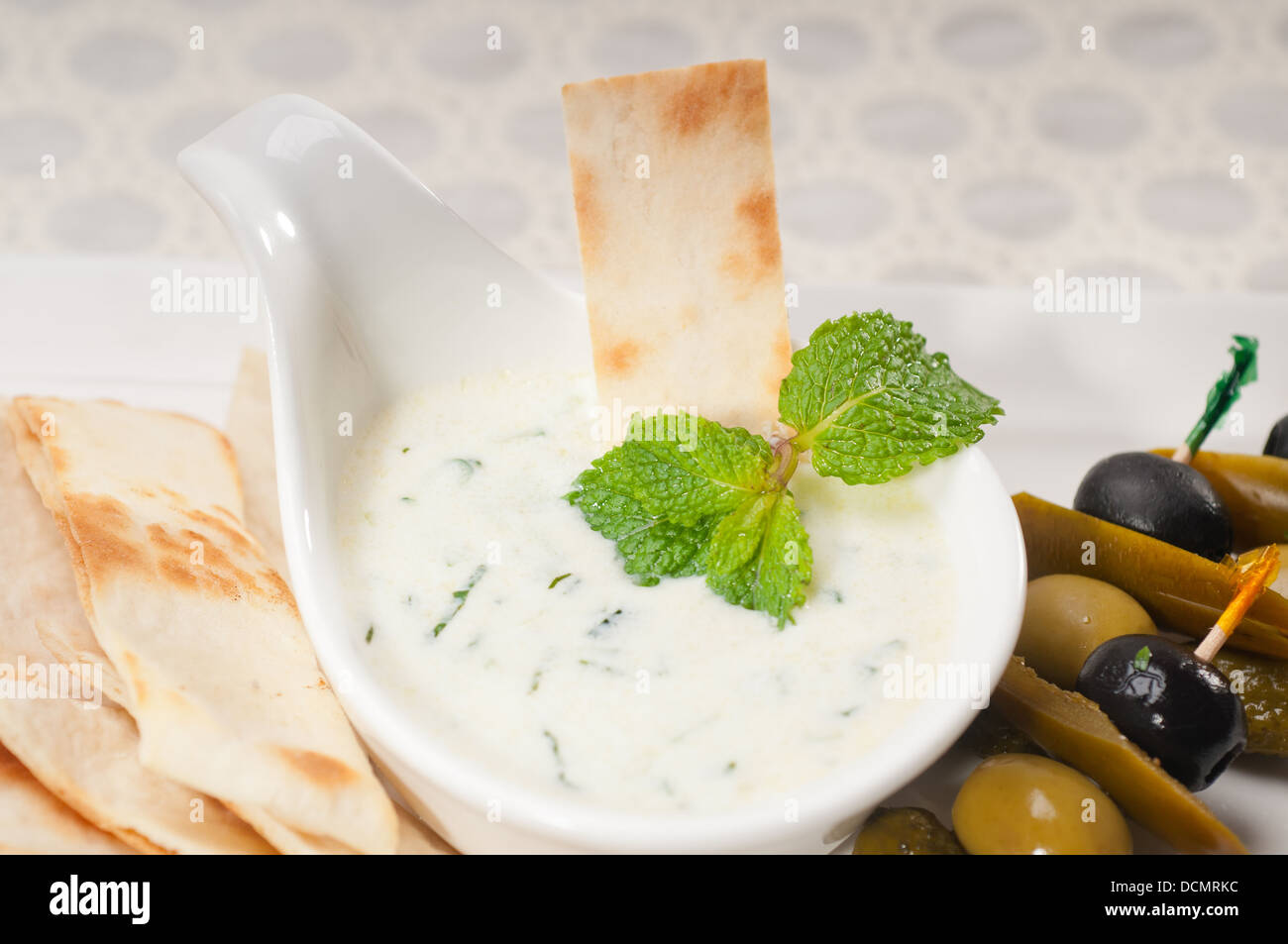 Greek Tzatziki yogurt dip and pita bread Stock Photo Alamy