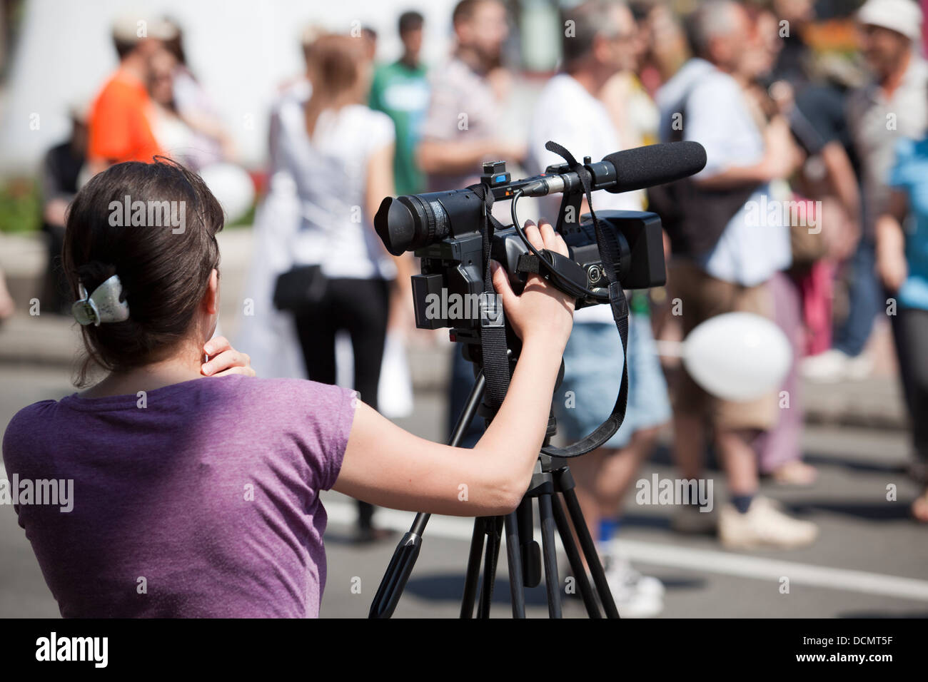 covering an event with a video camera Stock Photo Alamy